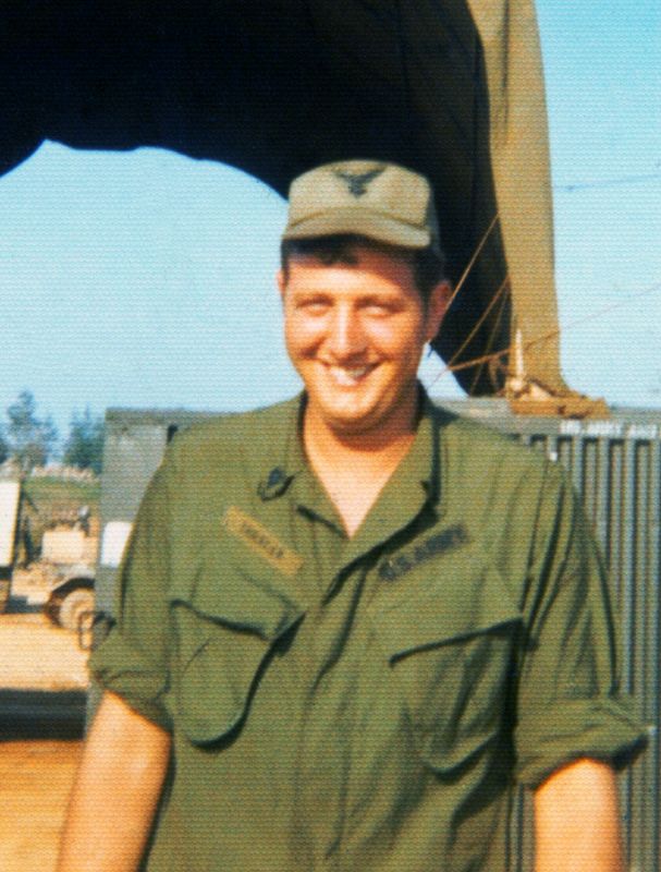 Specialist Trexler in front of aircraft maintenance hanger in Dong Ha, Vietnam